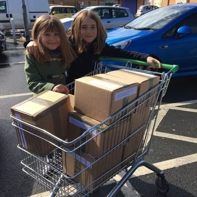 Happy days delivering Ohbots to the post office.